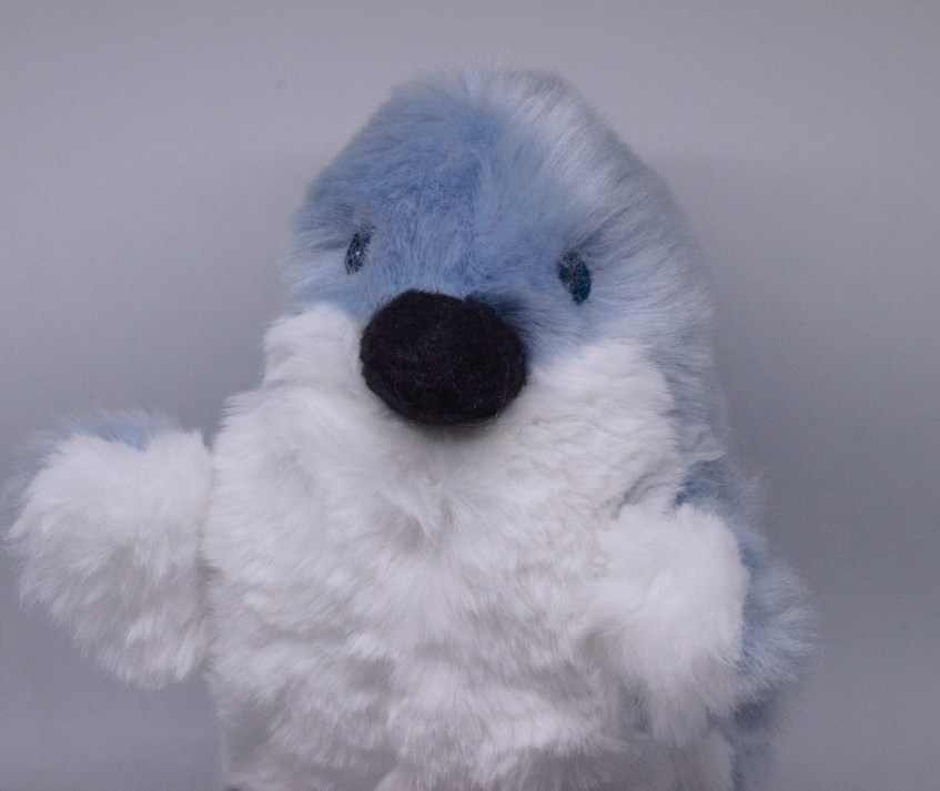 Peppy Penguin Plushie - a small blue fuzzy penguin