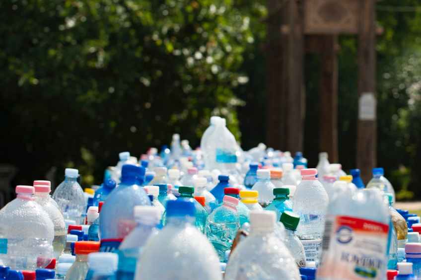 assorted plastic bottles and bottled water waste