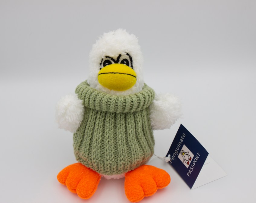 Sage Penguin - white stuffed penguin in light green handmade sweater