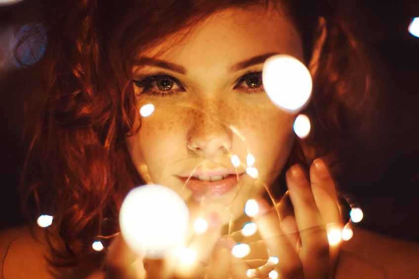Stargirl lets her light shine photography of a woman holding lights