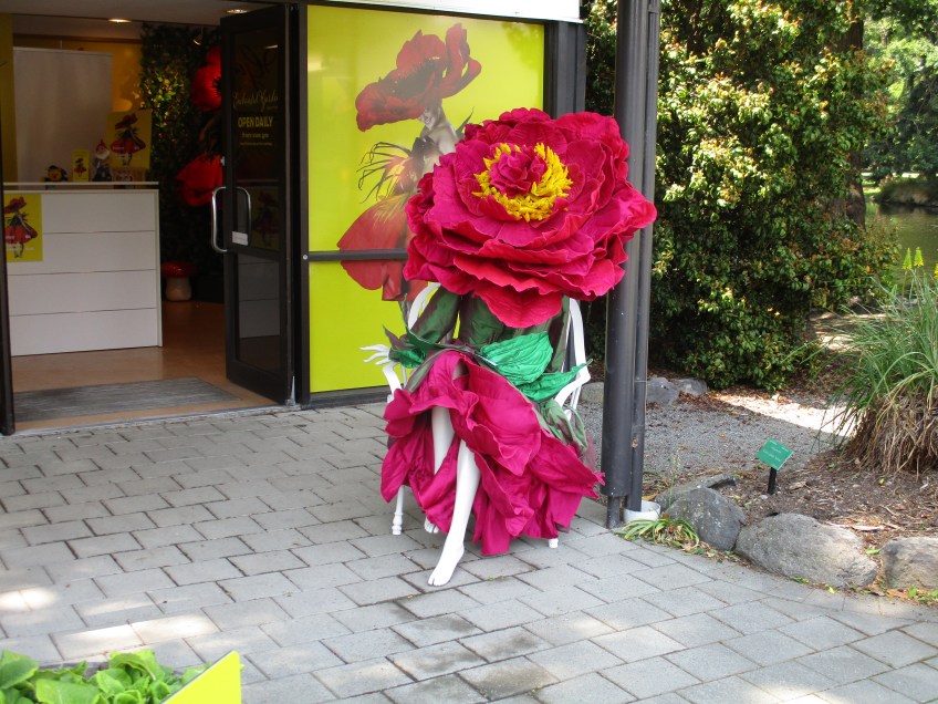 A flower costume outside Jenny Gillies Christchurch exhibition