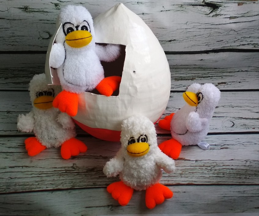 Hatched penguins with egg