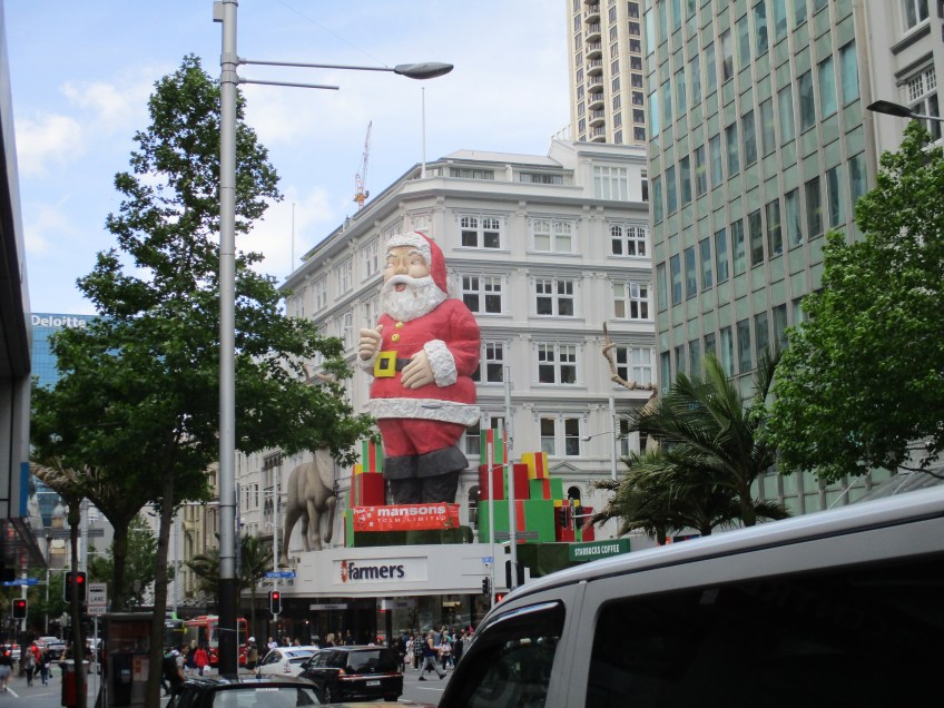 Santa Claus and two reindeer more than 4 stories tall